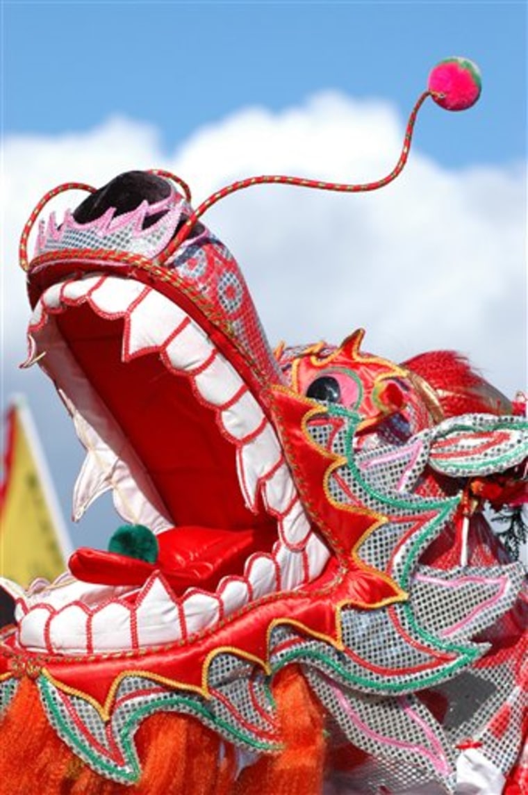 This photo released by Tourism British Columbia shows a colourful dragon's mouth costume in the Chinese New Year Parade in Vancouver's Chinatown.(AP Photo/Tourism British Columbia,Tom Ryan)**NO SALES**